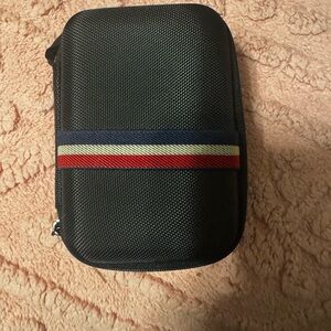 Stylish Black Travel Pouch with Red and Blue Accents